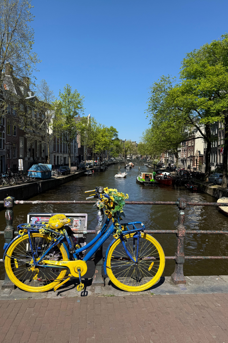 Amsterdam canal boat rental routes - scenic waterway through historic city